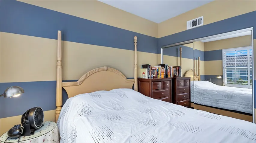 Spacious secondary bedrooms + mirrored closet doors.