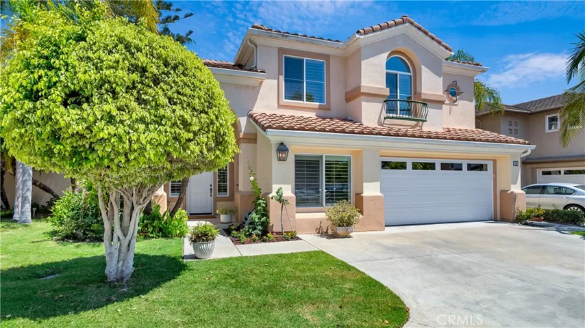 The two car garage has lots of storage plus an electric vehicle charger.
