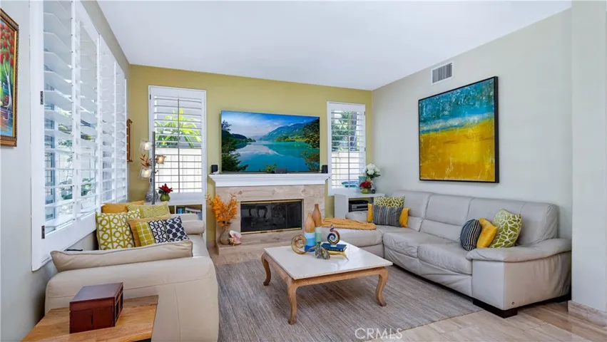 The family room provides seating for the whole family--a great TV spot.