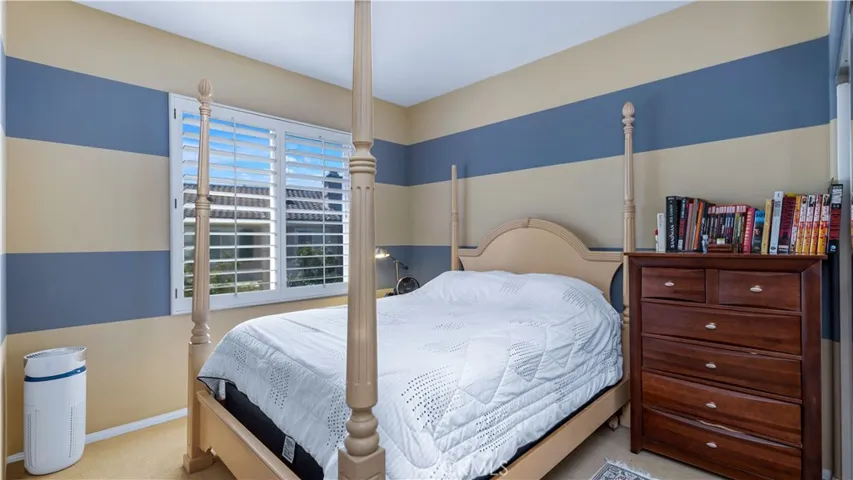 One of 3 secondary bedrooms upstairs.