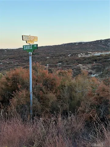 Street Sign in front of parcel.