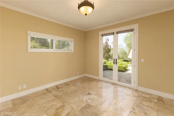 Bedroom #3 with view through French Doors