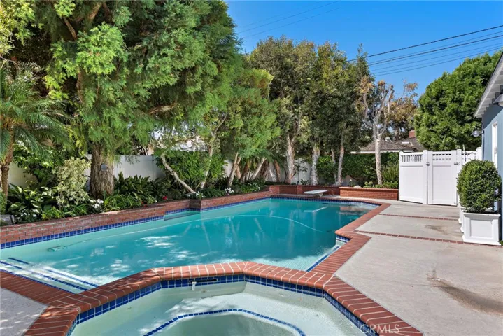 Rear yard pool, spa, built-in granite BBQ and entertaining areas