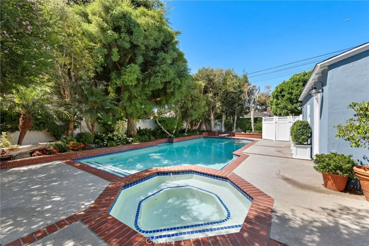 Rear yard pool & spa with built-in BBQ