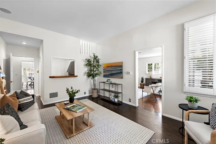 Family room with hardwood floors and wet bar