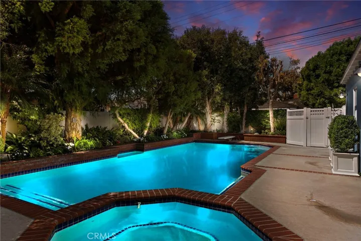 Transformative evening view of pool & spa