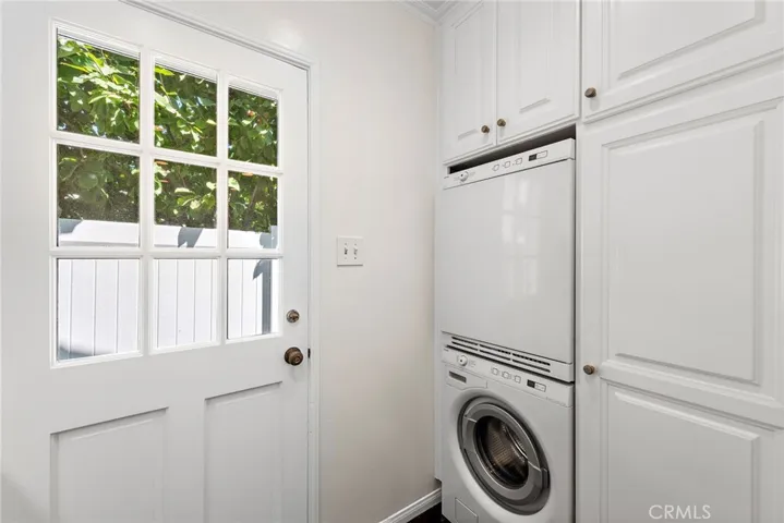 Laundry room with space for stacked washer/dryer off the kitchen