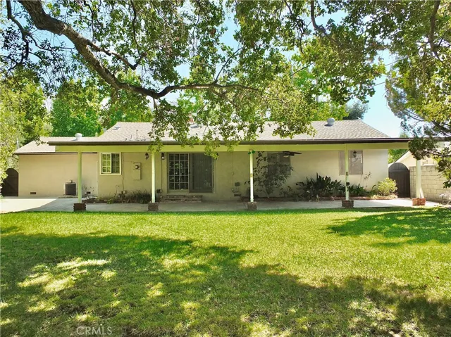 secluded serene backyard perfect for entertaining with a adequate sized side yard