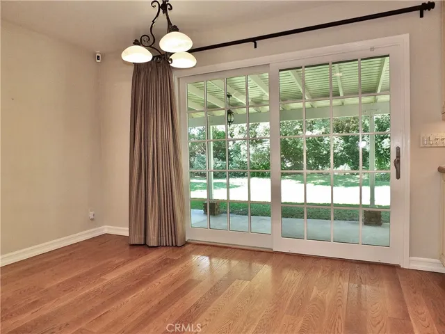 sliding patio door leading to the secluded serene backyard