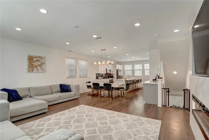 second level.  Family room with fire place and kitchen
