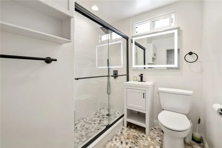 Newly-renovated bathroom in front cottage