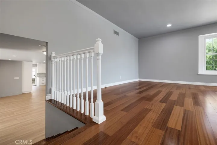 Stairs lead to Upper Level w/ Family Room