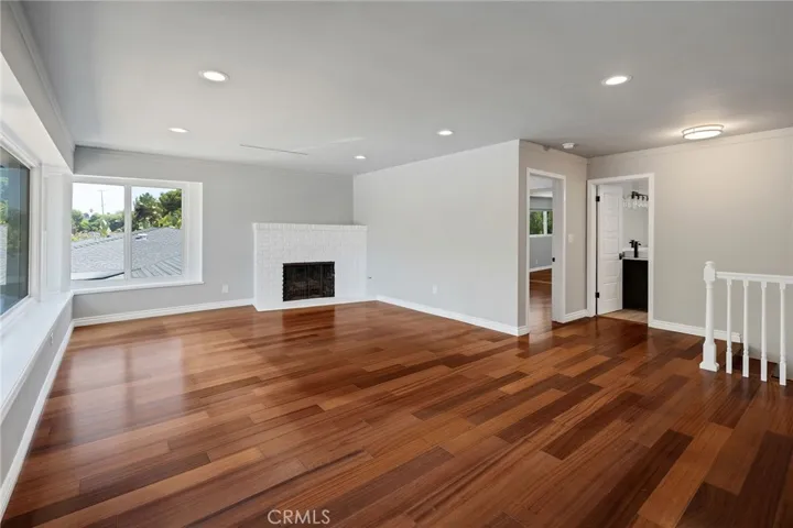 Doors Lead to Private Primary Bedroom & Bathroom