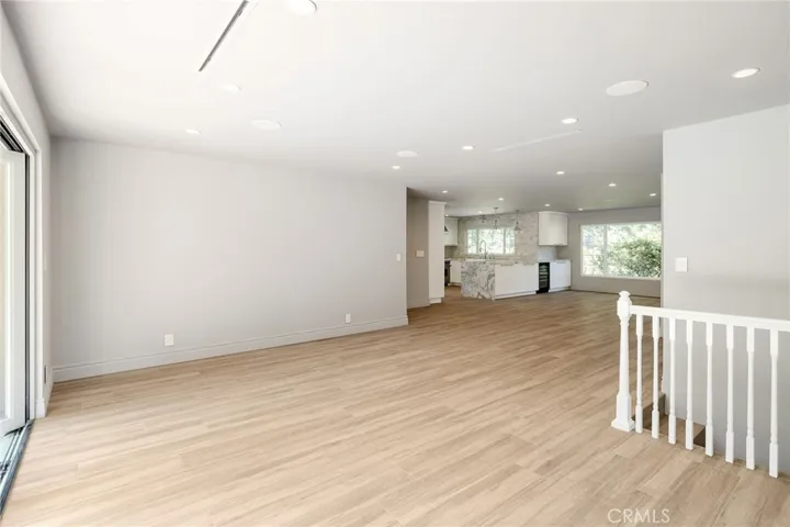 Another angle of Living Room - Stairs Lead to Laundry Room & Garage