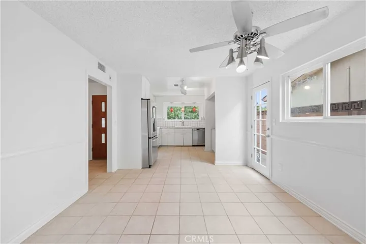 The Eat-In Kitchen has tile floors, lots of counter & storage space, plus built-in appliances
