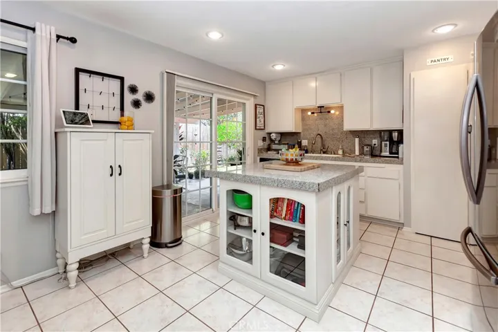 Well Maintained Island Kitchen with Adjoining Dining Area