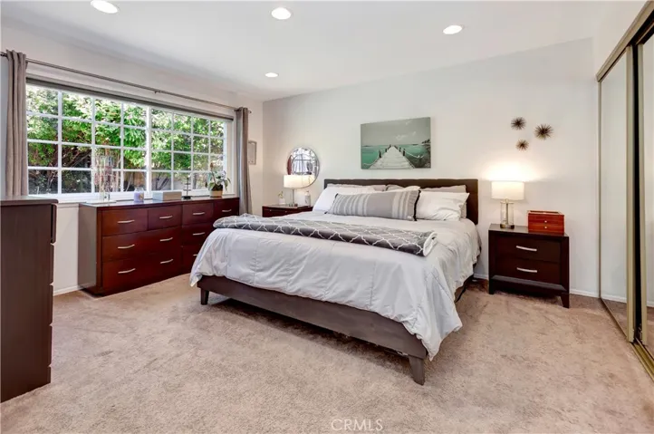 Generous Primary Bedroom with Lovely View to Outdoor Living Area