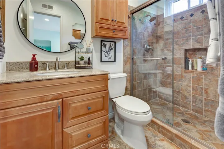 Primary Bath with Upgraded Shower Stall and Vanity