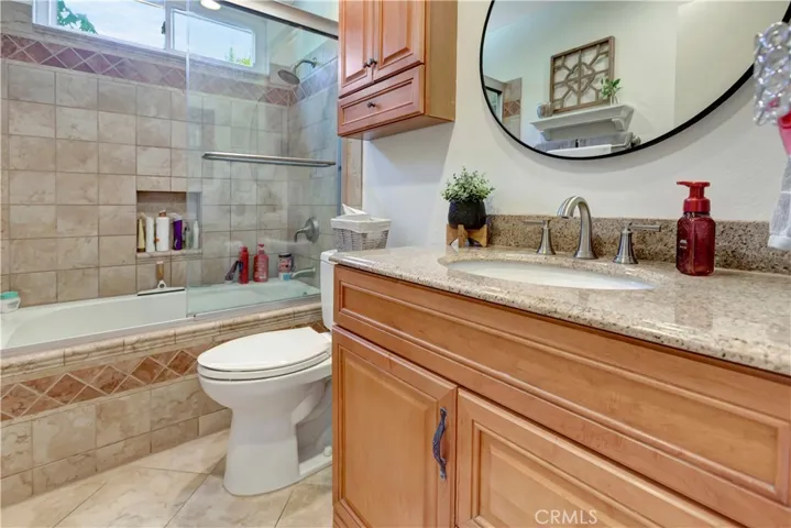 Common Bath Supporting Bedrooms #2 and #3 with Upgraded Tub/Shower & Vanity