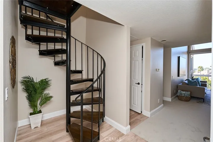 Spiral staircase to the impressive loft