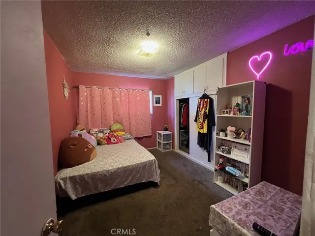 11607