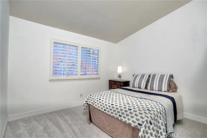 Cozy upstairs bathroom carpeted for comfort