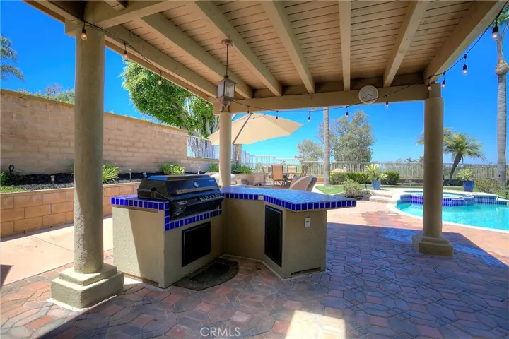 The Built-in BBQ is conveniently located under patio shelter