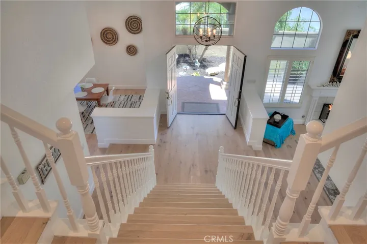 View from the second floor landing to the double door entry