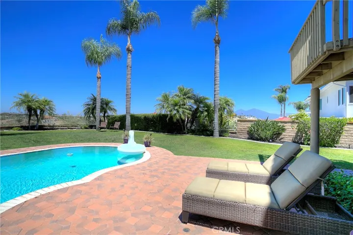The backyard oasis beckons with tranquility and privacy