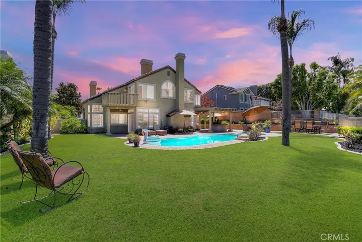 Perfect yard for outdoor living and entertaining against the backdrop of beautiful views day or night