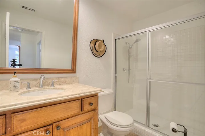 The laundry room and downstairs bathroom are conveniently located off the kitchen