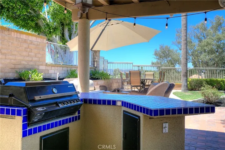 With a covered patio over BBQ station, and endless room for pets and play, this huge exterior space is equally suited to quiet dinners or larger events.