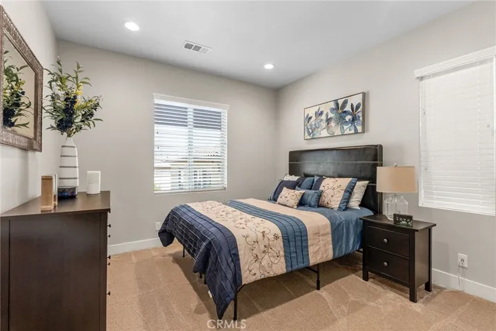 Spacious upstairs bedroom with attached bath.