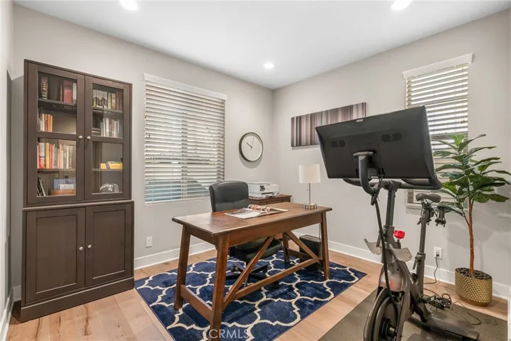 Downstairs office space can be converted into a bedroom that is perfect for a mother-in-law room or for visiting guest.