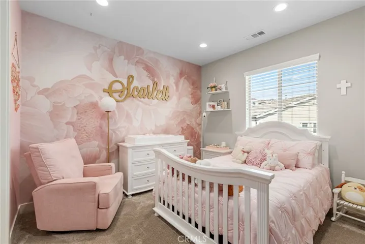 Additional upstairs bedroom with attached bath.