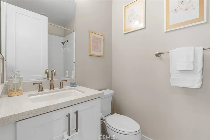 Attached bathroom has a shower tub.