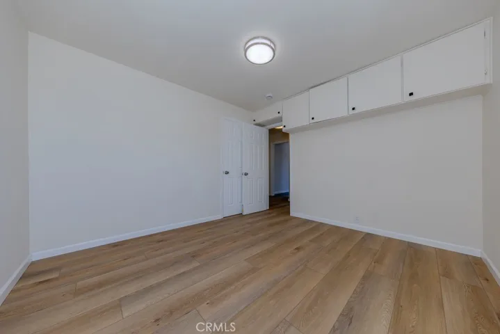 2nd Bedroom with upper storage cabinets