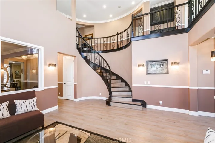 Beautiful spiral rod iron staircase gives gorgeous look