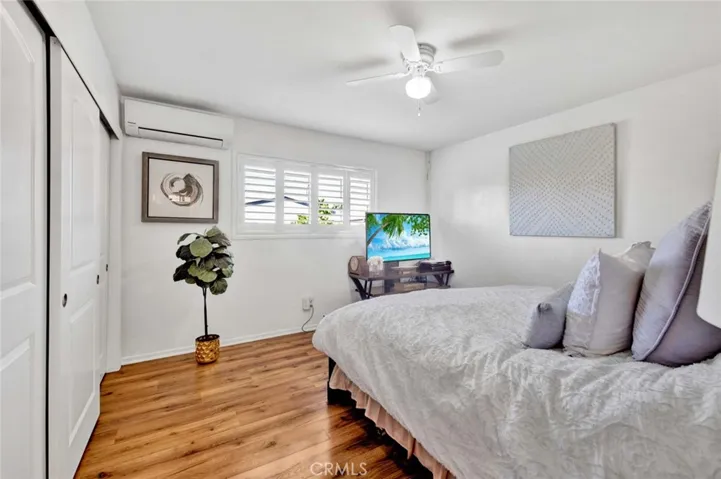 Good-Sized Bedroom that includes small sitting area