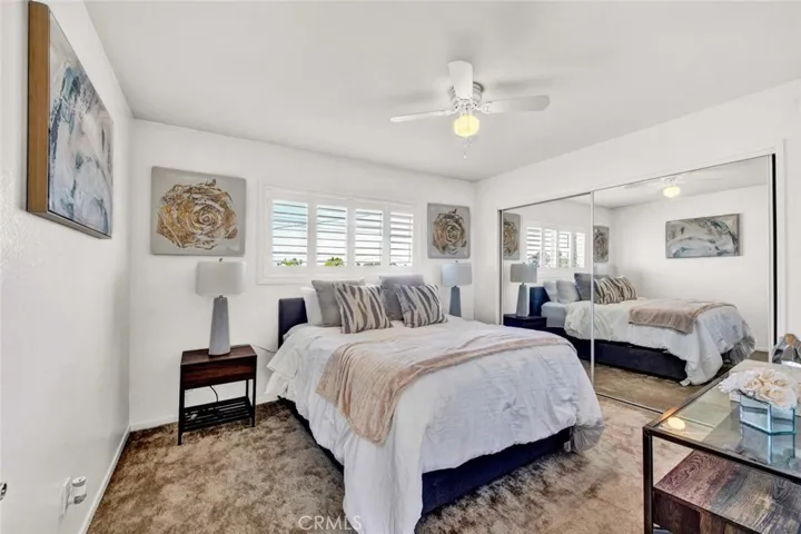 Good-Sized Bedroom that includes small sitting area