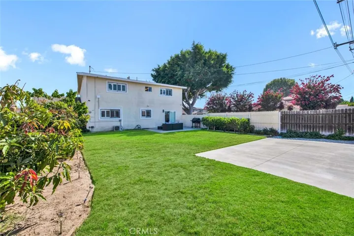 Park Like Backyard with Side Gate to RV Concrete Parking pad