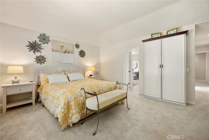 Remodeled primary suite with en suite bath are fresh and serene.
