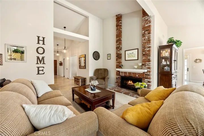 Fireplace in formal living room is a beautiful focal point. Central air conditioning and heat systems will provide comfort in all seasons.