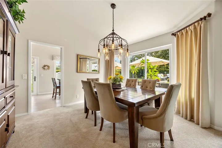 This is the formal dining area. Whether you set an elegant or casual table, your guests will feel right at home dining here.