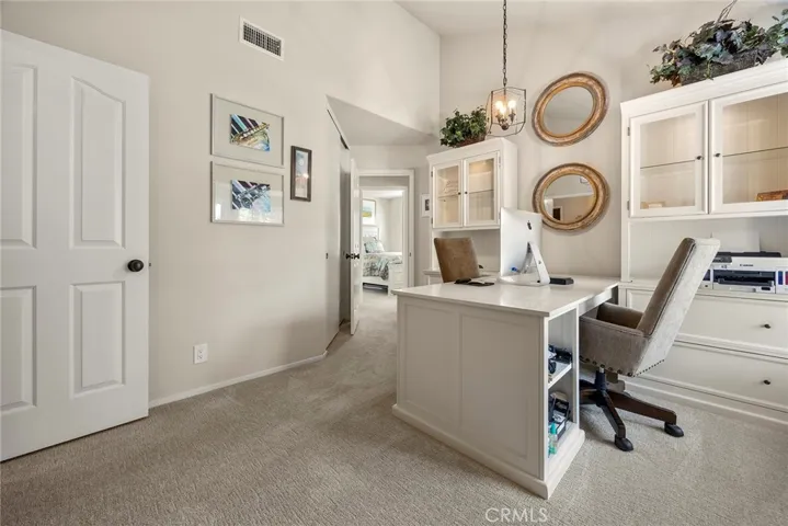 This 4th bedroom with a closet is adjacent to a remodeled full bath, so it could also be used as a guest room.
