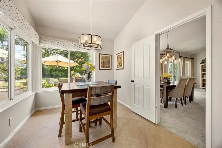 This view shows that the eating spaces are adjacent. This makes hosting large gatherings easy.