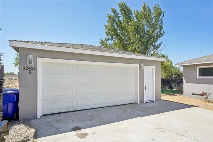 2 car garage and washer/dryer hook ups inside garage