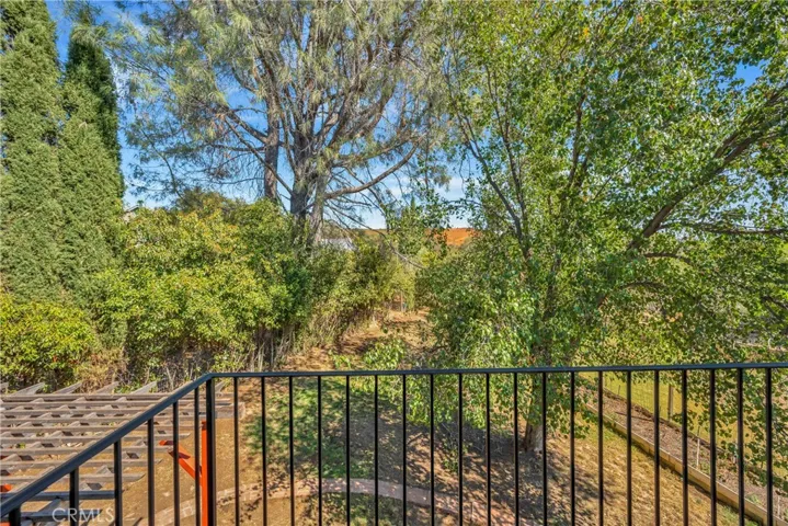 Primary Terrace View - Please note the lot next door (to the left) has been thoroughly cut, trimmed, and thinned out so you can enjoy a nice view! Lot is for sale as well.