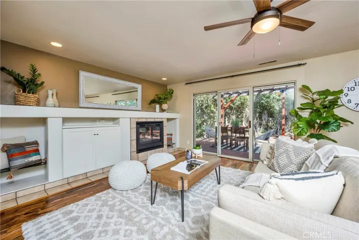 Living room with built-ins and propane fireplace