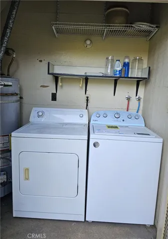 View of laundry closet on balcony.